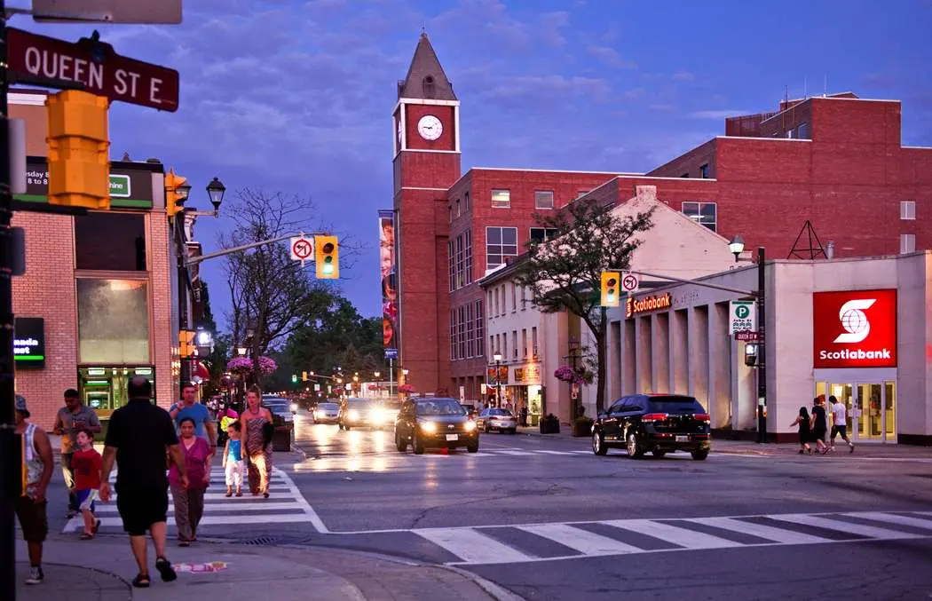 Pearson Airport to Brampton transfer – black SUV on a tree-lined downtown street