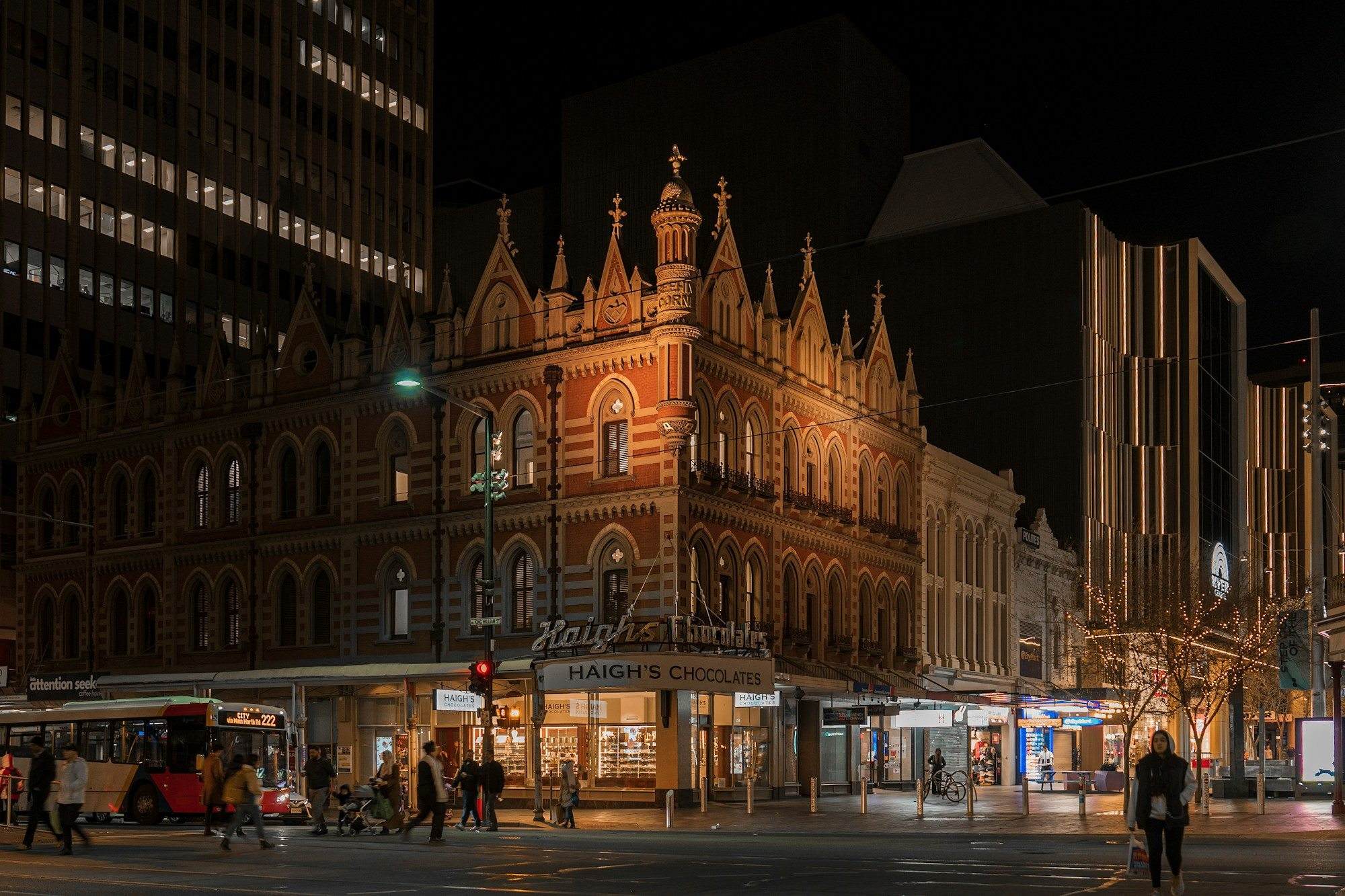 Historic buildings lit up on an Adelaide street at night