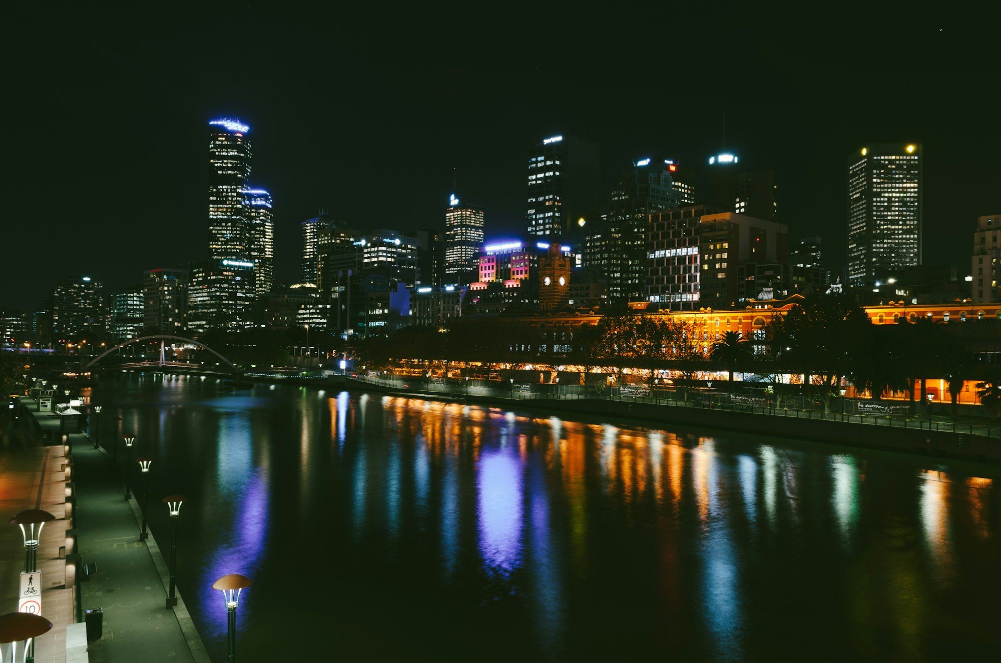 Melbourne's skyline reflected in the Yarra River at night