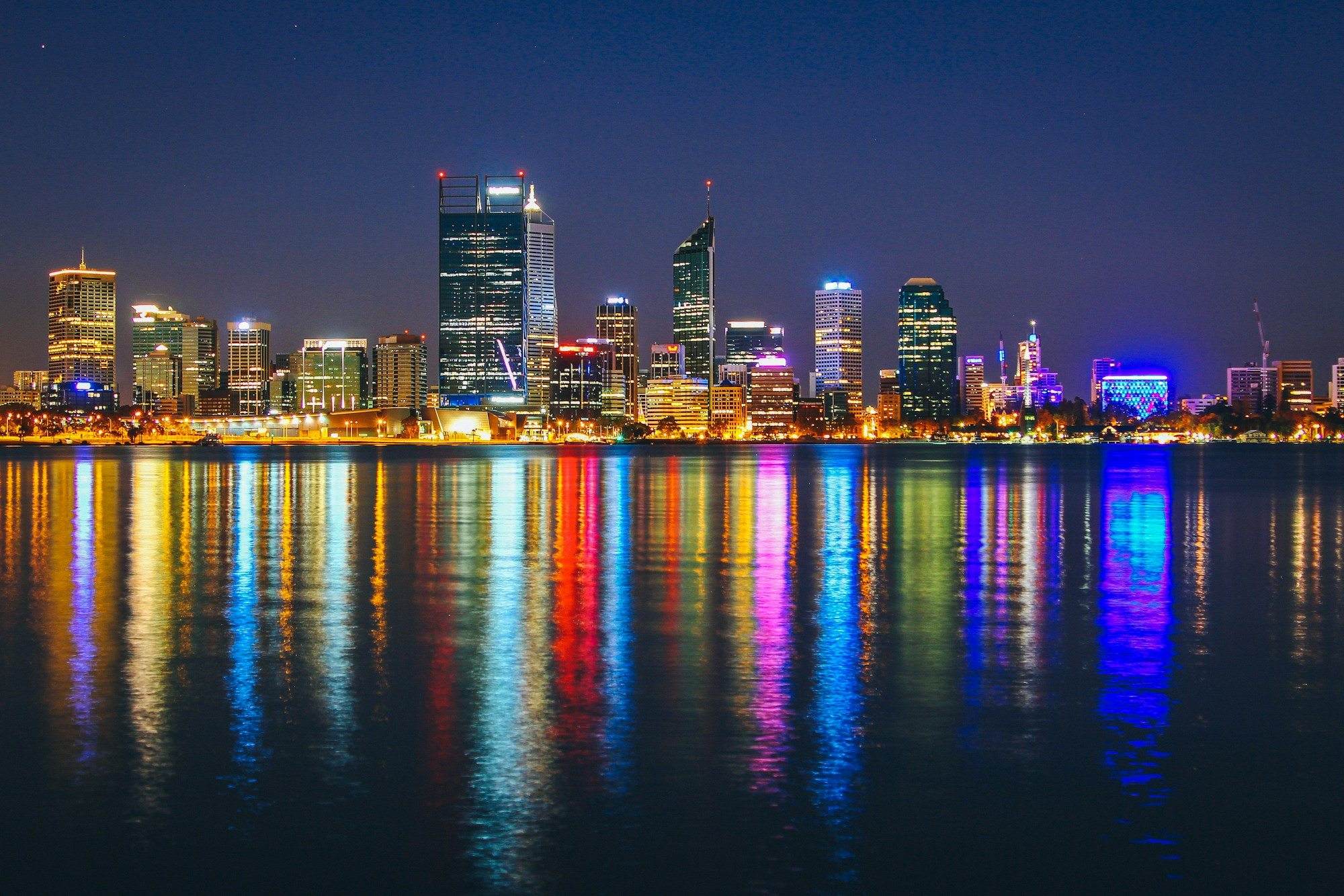 Perth's skyline reflected in the Swan River at night