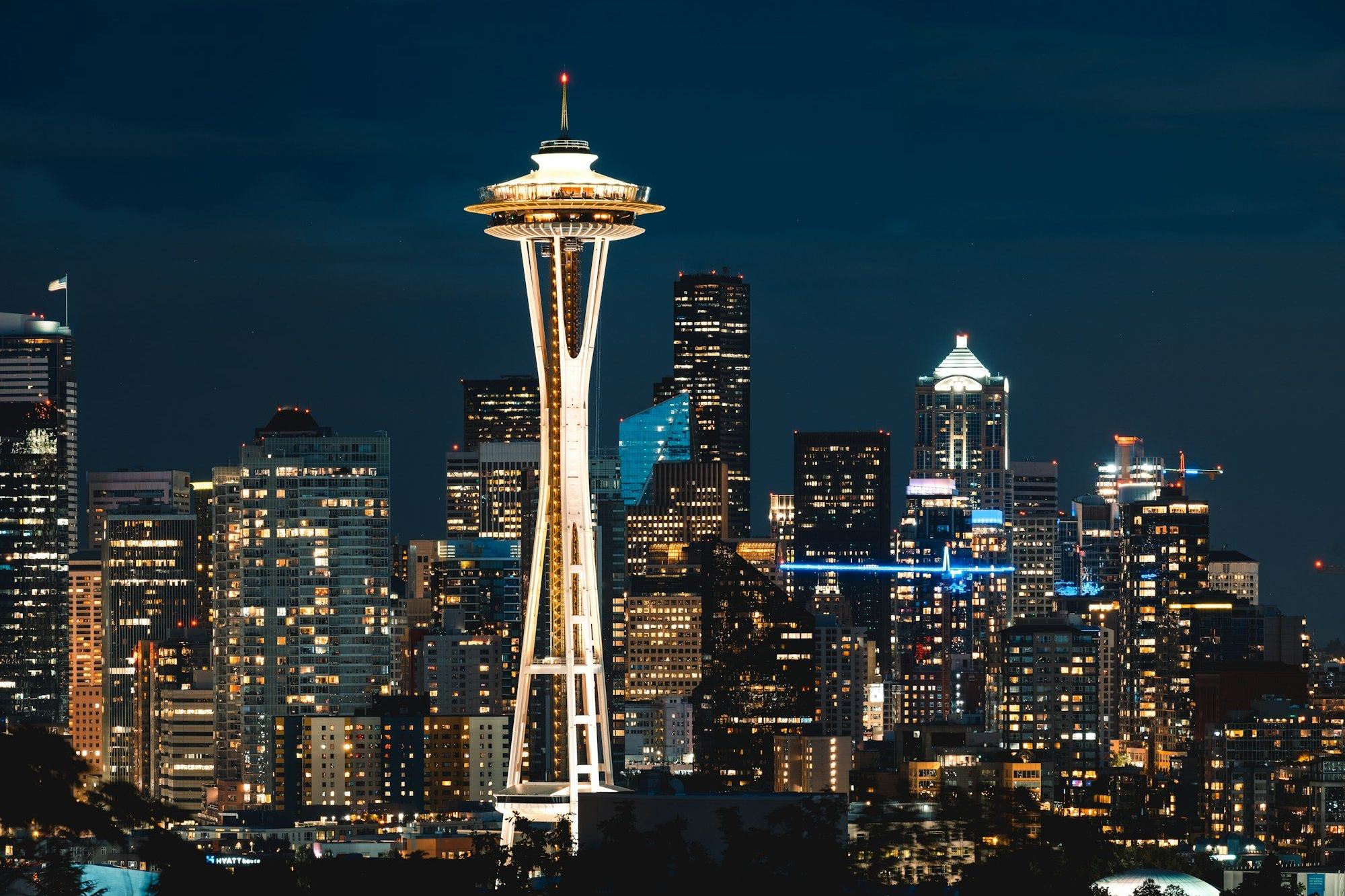 The Space Needle and downtown Seattle lit up at night
