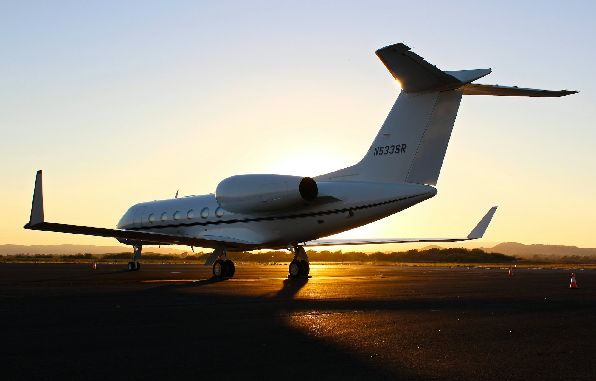 Destinations 1 Private jet on the tarmac at golden hour