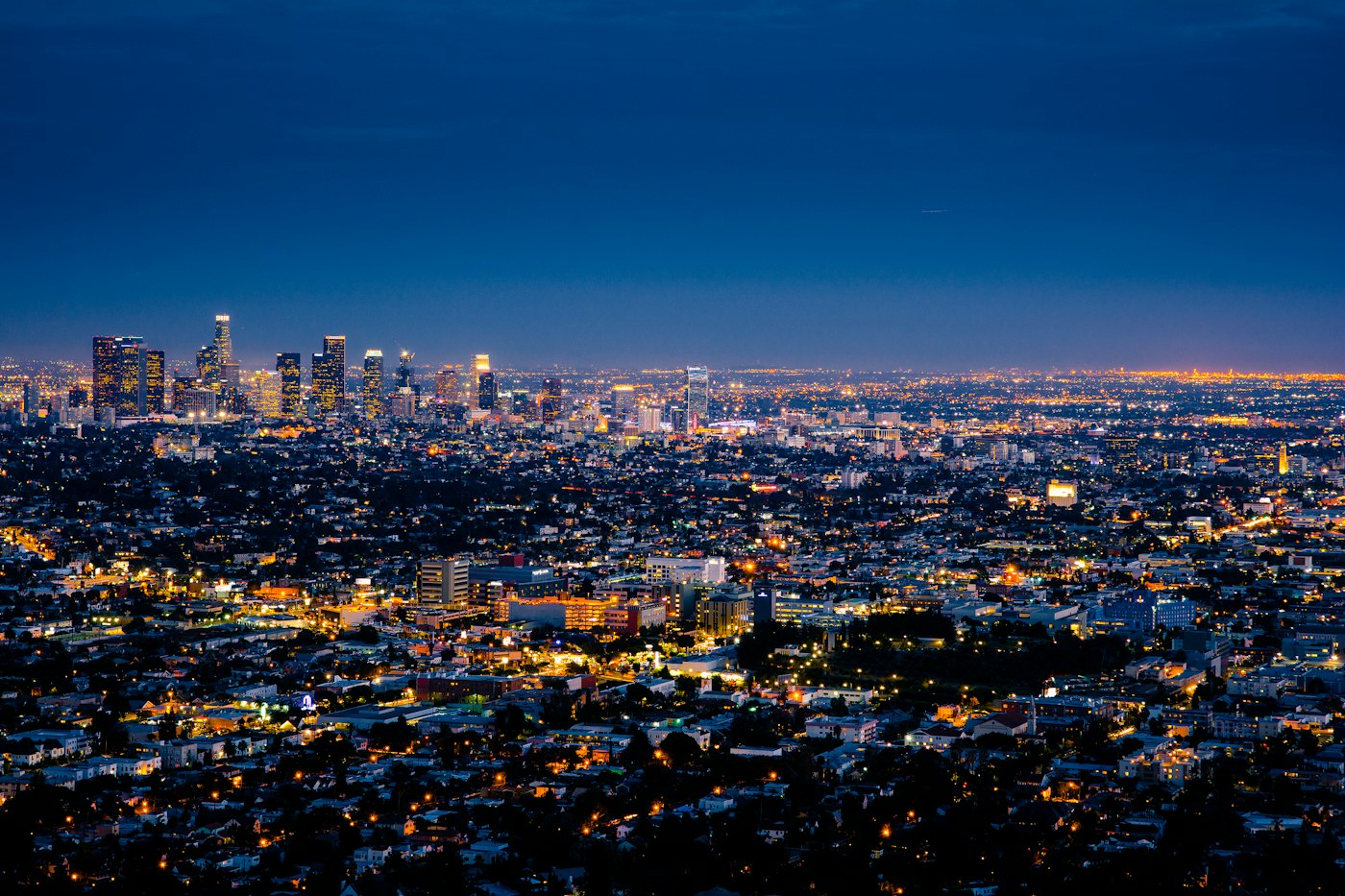 Los Angeles skyline lit up at dusk